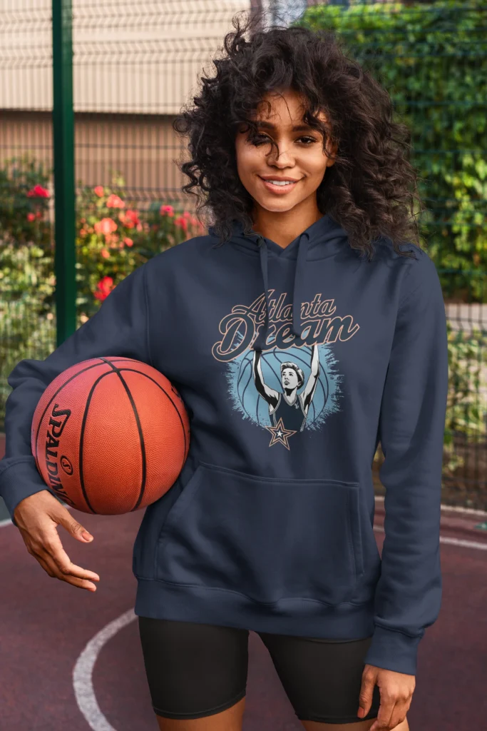 woman with basketball wearing Atlanta dream hoodie from Supreest